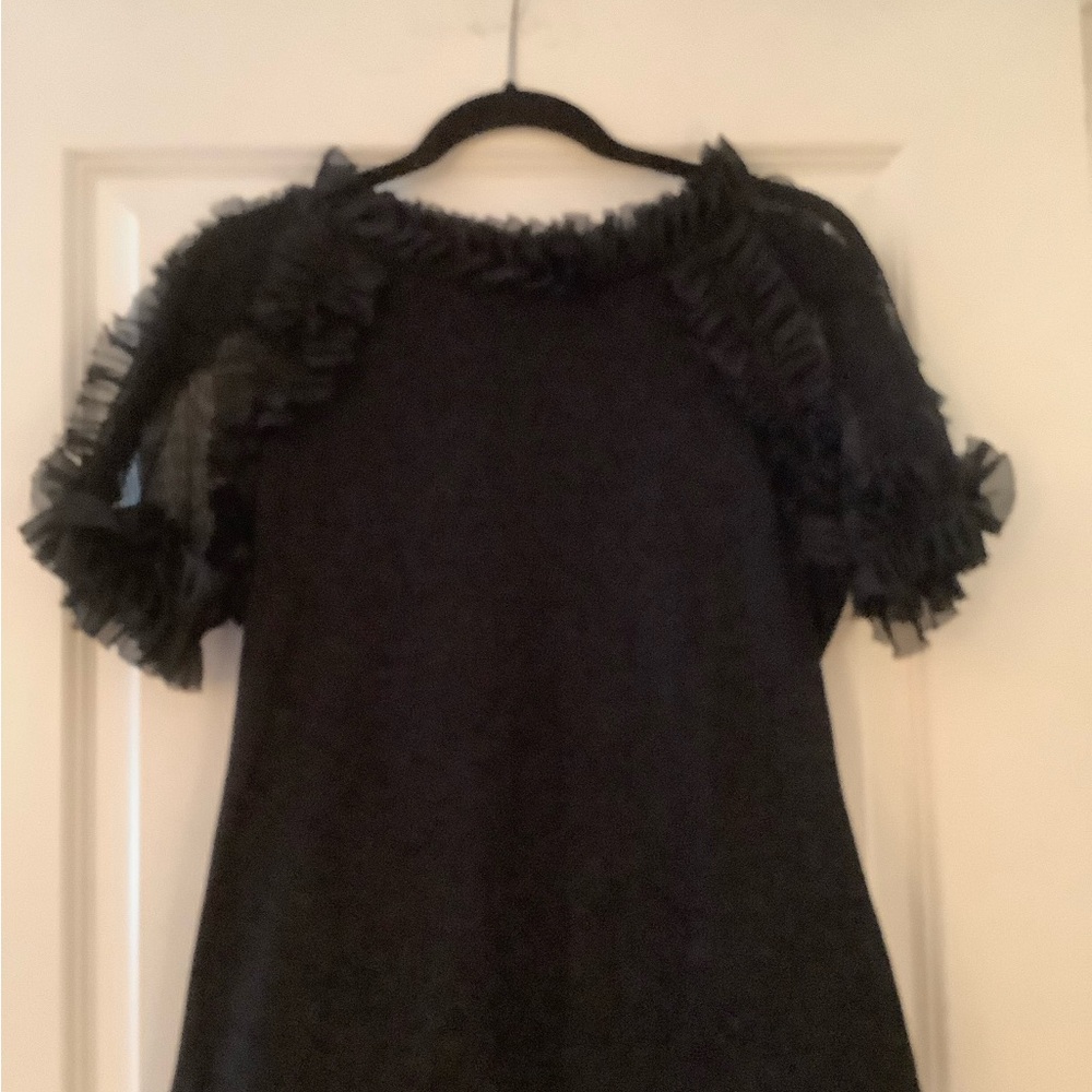 Ruffled short sleeve black top